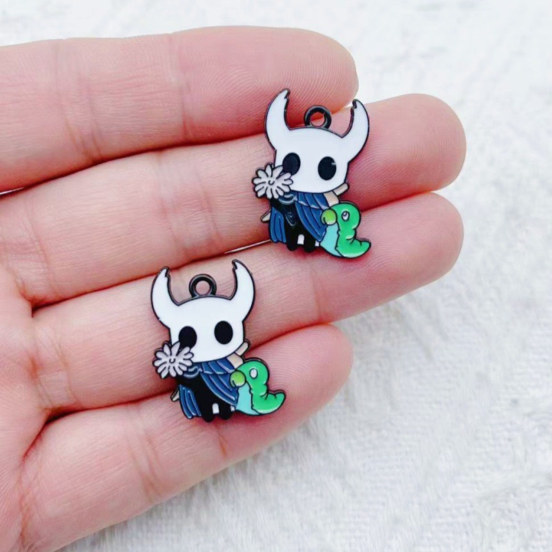 10 個合金ドリップオイル漫画アクセサリーペンダント DIY - Earrings のレビューと価格