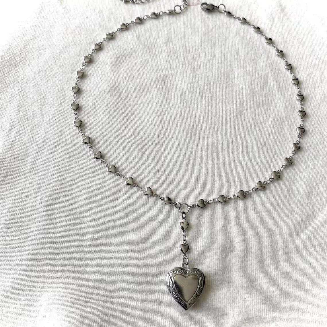 ロザリオ ラリアット チェーン ネックレス ハート ロケット - Heart Locket Necklace Photo のレビューと価格